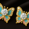 blue and pink enamel wings